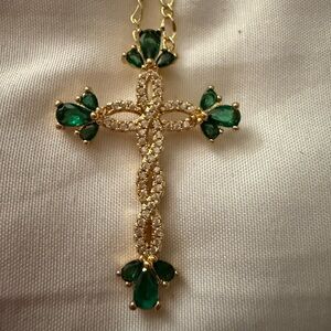 Elegant Gold and Emerald Green Twisting Cross Pendant Necklace